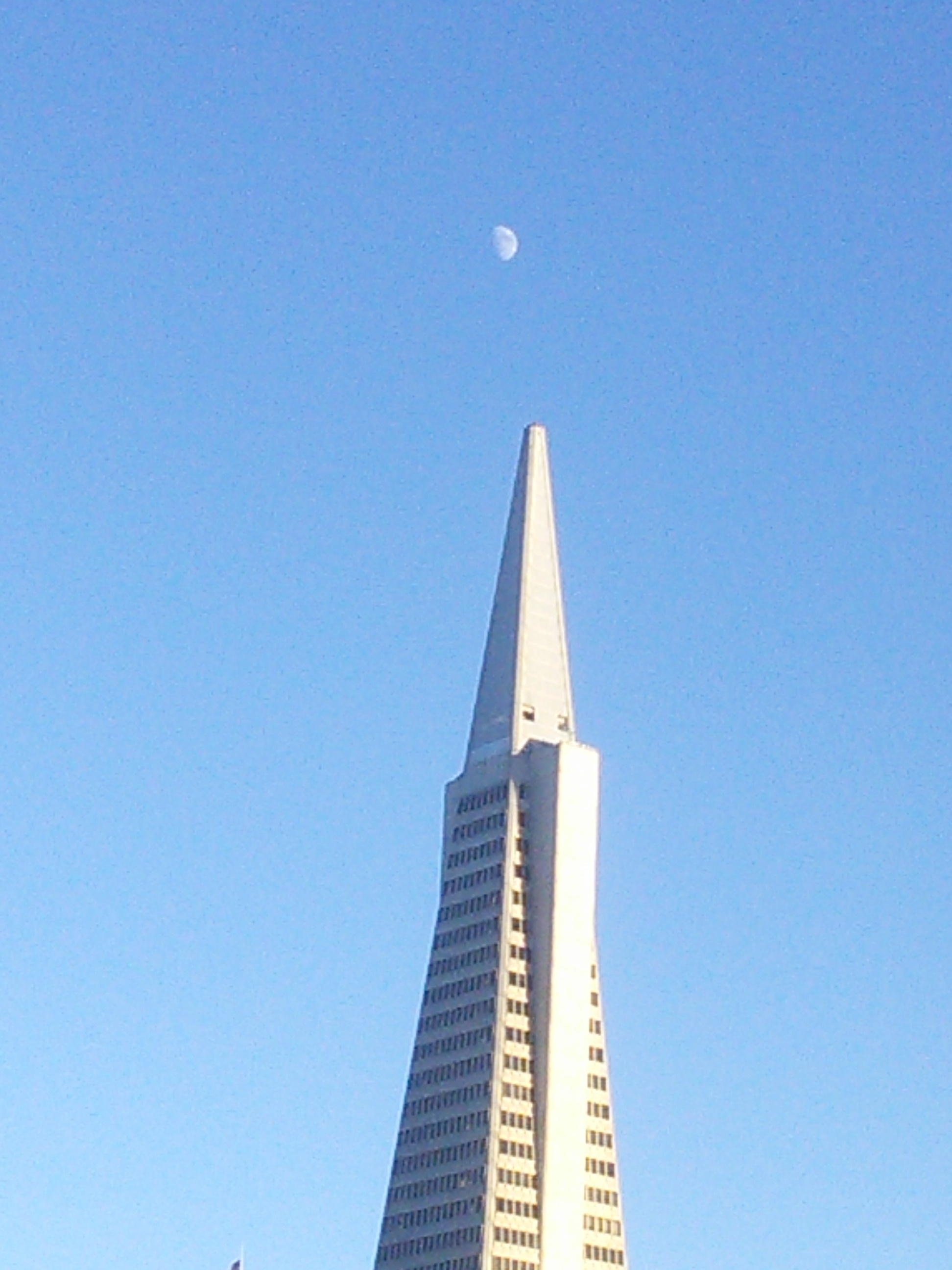 pyramid building with Moon